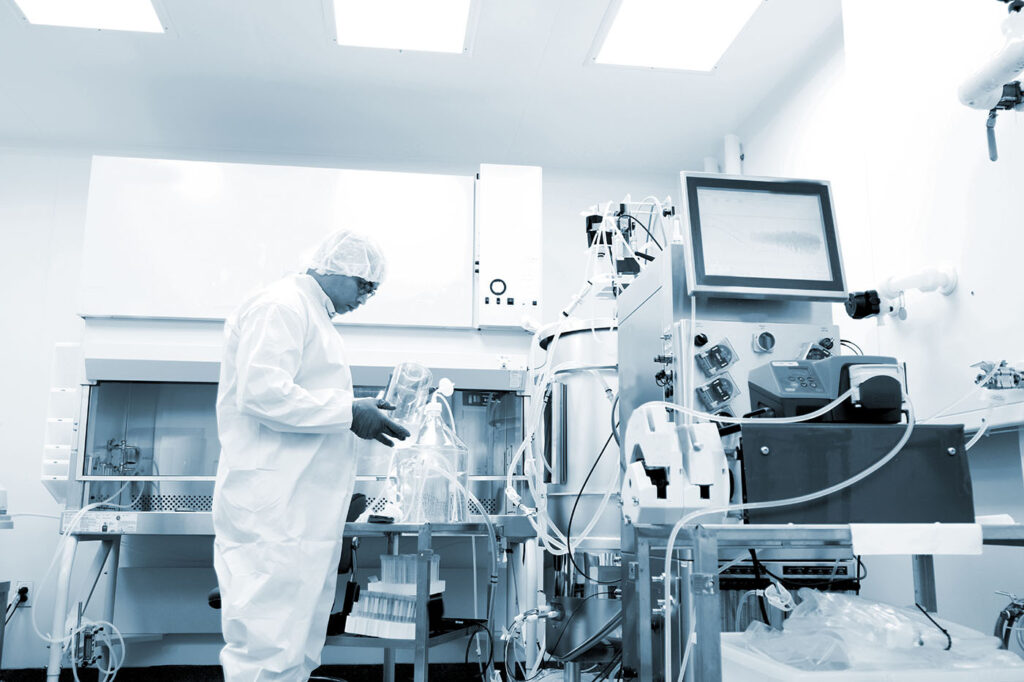 Scientist working in a clean room for cell culture and cloning cells