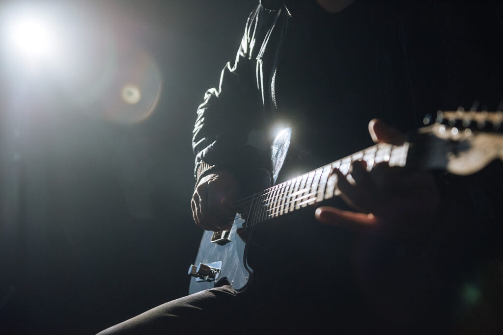 Close-up of a guitarist playing the guitar