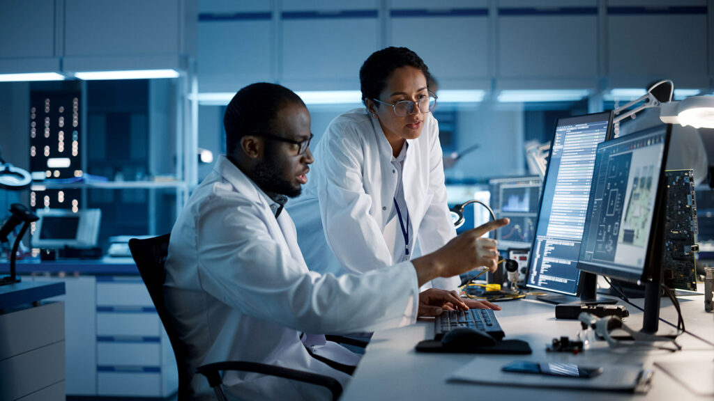 Researchers With Computer