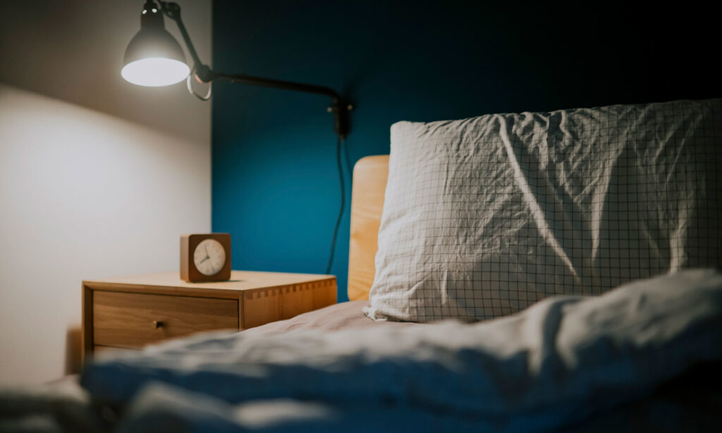 5 Ways To Get Deep Sleep When You're Not In Your Own Bed