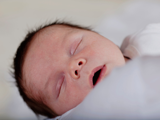 Respiratory Infection Immune Differences Point to Different Treatments Close up of infants sleeping face